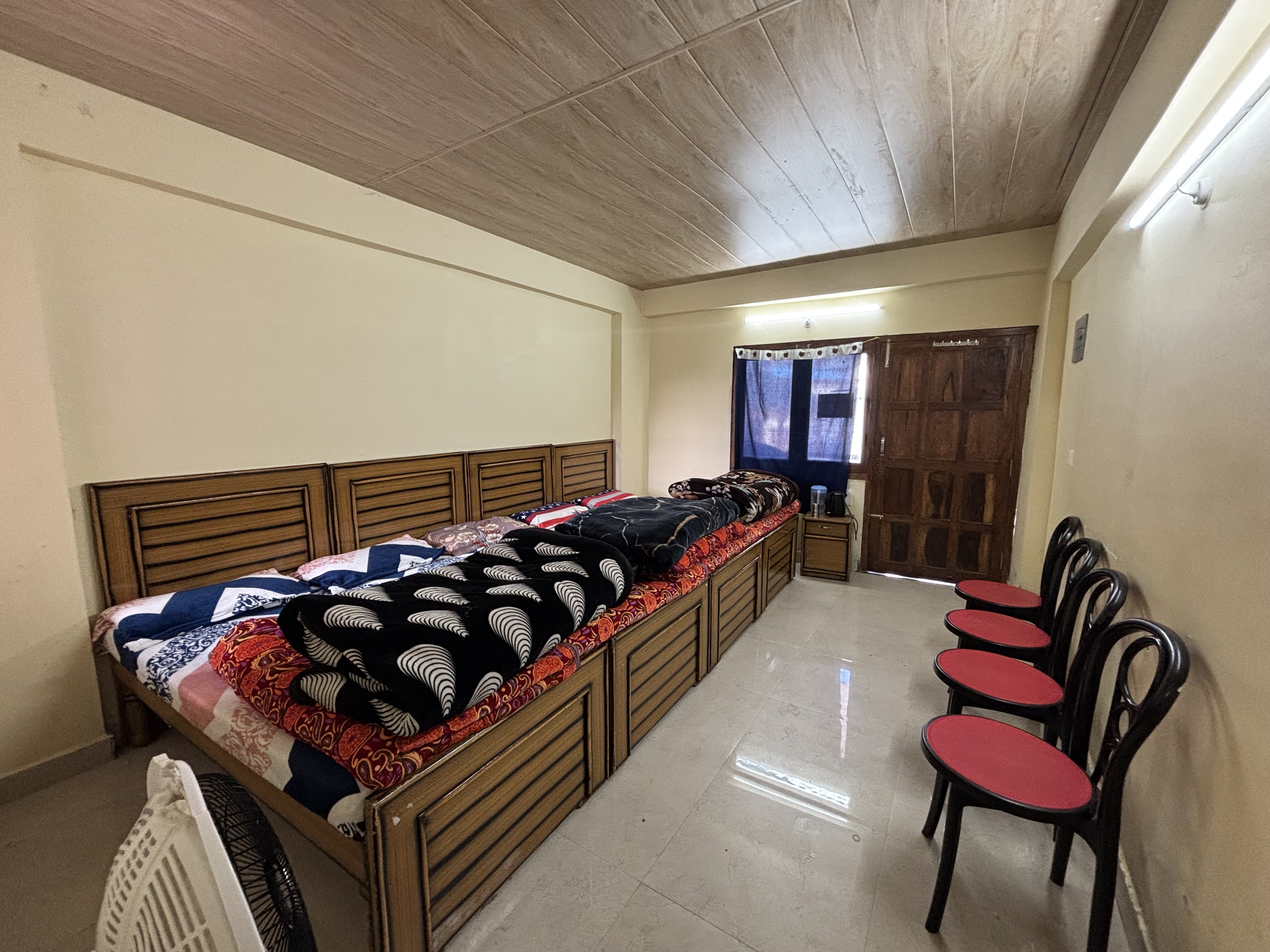 Cozy 4-bed room with warm lighting and mountain view